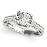 Platinum Round Cut Solitaire Diamond Ring with Pavé Band and Six-Prong Setting