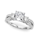 Platinum Cushion Three-Stone Diamond Ring with Pavé Split Shank and Four-Prong Setting