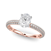 Rose gold Oval Solitaire with Pave Band and Four-Prong Setting