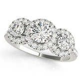 Platinum Three-Stone Round Halo Diamond Ring with Pave Band and Prong Setting