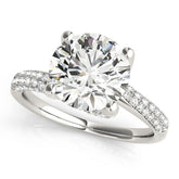 White gold Round Cut Diamond Solitaire Engagement Ring with Pave Band and Four-Prong Setting