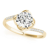 Yellow gold Round Brilliant Solitaire with Pavé Band and Four-Prong Cushion Setting