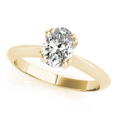 Yellow gold Oval Solitaire Diamond Ring with Four-Prong Setting on a Tapered Band