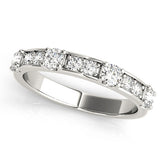Platinum Round Diamond Channel Set Eternity Band with Prong Setting