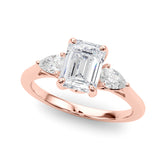 Rose gold Three-Stone Oval Cut Diamond Ring with Pear Side Stones on a Platinum Band and Four-Prong Setting