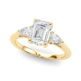 Yellow gold Three-Stone Emerald Cut Diamond Ring with Pear Side Stones on a Platinum Band and Four-Prong Setting