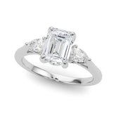 Silver Three-Stone Princess Cut Diamond Ring with Pear Side Stones on a Platinum Band and Four-Prong Setting