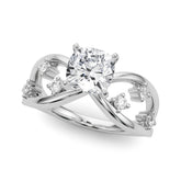 White gold Cushion Cut Solitaire Diamond with Side Stones on Criss-Cross Band and Four-Prong Setting