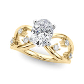 Yellow gold Oval Cut Solitaire Diamond with Side Stones on Criss-Cross Band and Four-Prong Setting
