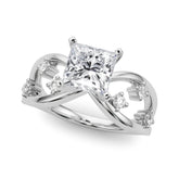 White gold Princess Cut Solitaire Diamond with Side Stones on Criss-Cross Band and Four-Prong Setting