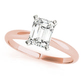 Rose gold Emerald Cut Solitaire Ring with Four-Prong Setting on a Classic Band