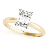 Yellow gold Emerald Cut Solitaire Ring with Four-Prong Setting on a Classic Band