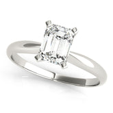 White gold Emerald Cut Solitaire Ring with Four-Prong Setting on a Classic Band