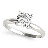Platinum Heart Cut Solitaire Engagement Ring with Round Band and Four-Prong Setting
