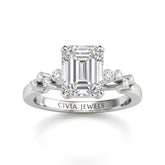 White Gold Emerald Cut Engagement Ring With Diamond Scatter Accent Shoulders And Classic Four-Prong Setting
