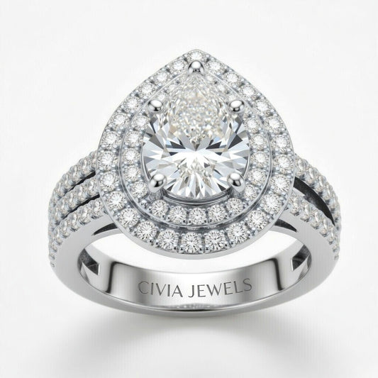 White Gold Pear Cut Double Halo Engagement Ring With Four Prong Setting And Diamond Pavé Split Band