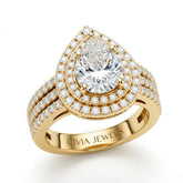 Yellow Gold Pear Cut Double Halo Engagement Ring With Four Prong Setting And Diamond Pavé Split Band