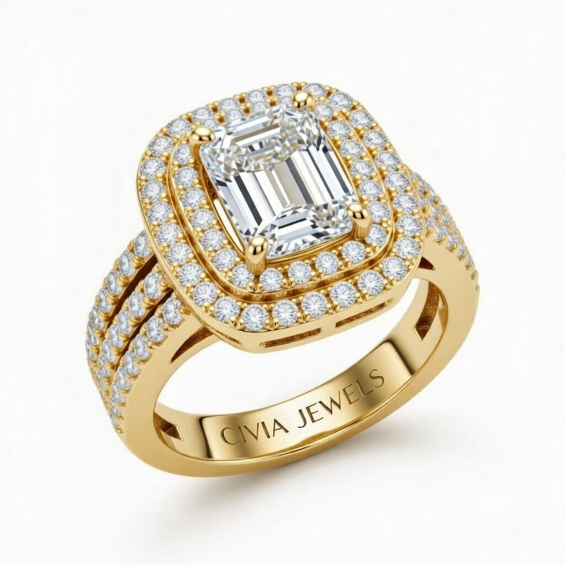 Yellow Gold Emerald Cut Double Halo Engagement Ring With Four Prong Setting And Diamond Pavé Split Band