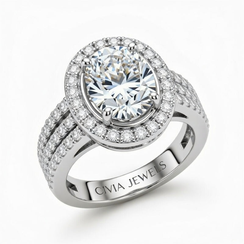 Silver Oval Cut Double Halo Engagement Ring With Four Prong Setting And Diamond Pavé Split Band