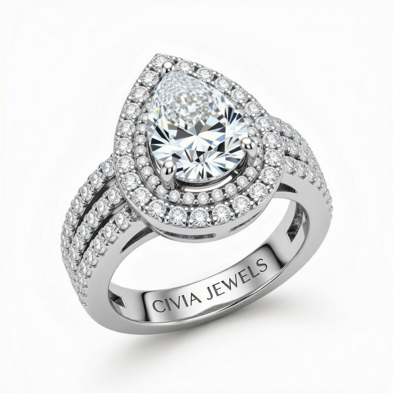 Silver Pear Cut Double Halo Engagement Ring With Four Prong Setting And Diamond Pavé Split Band