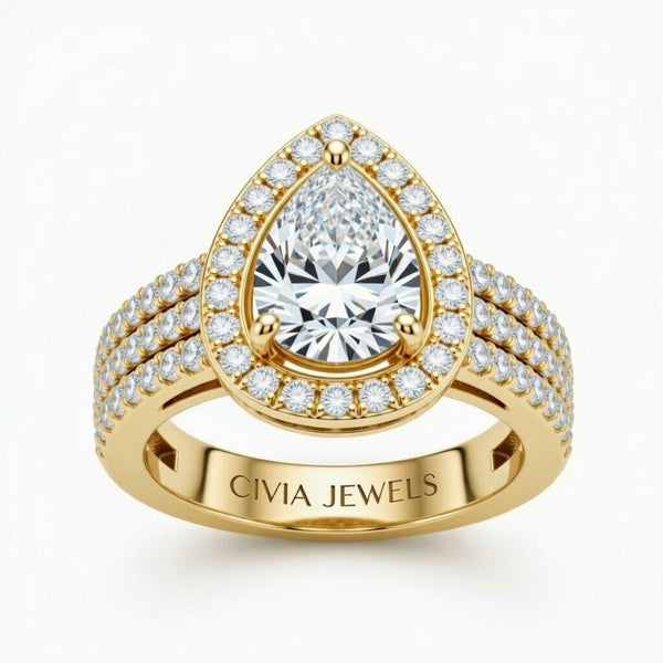 Yellow Gold Pear Cut Double Halo Engagement Ring With Four Prong Setting And Diamond Pavé Split Band