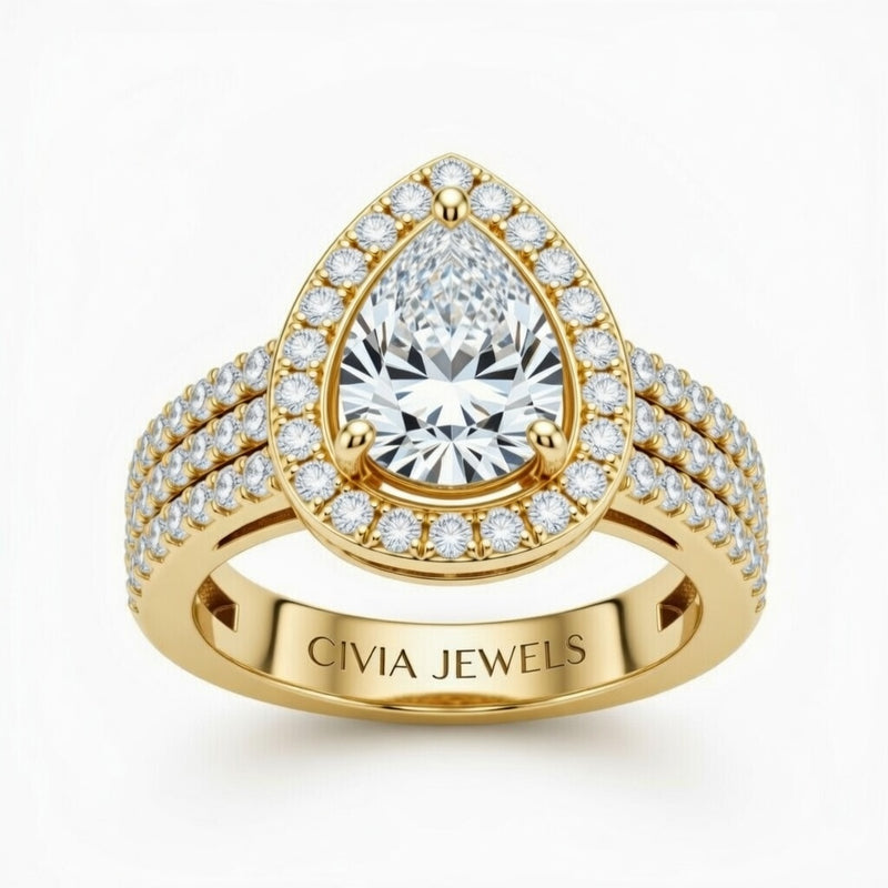 Yellow Gold Pear Cut Double Halo Engagement Ring With Four Prong Setting And Diamond Pavé Split Band