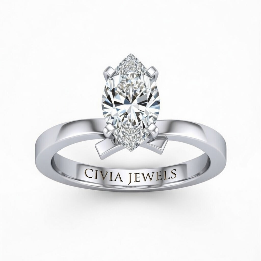 White Gold Marquise Diamond Solitaire Engagement Ring With Modern Twist Shank