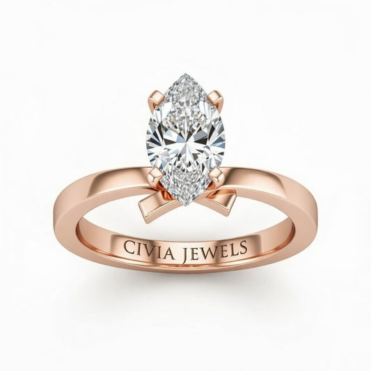 Rose Gold Marquise Diamond Solitaire Engagement Ring With Modern Twist Shank