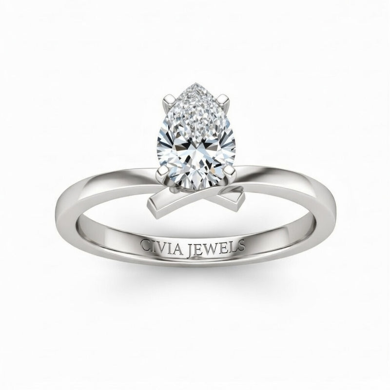 White Gold Pear Diamond Solitaire Engagement Ring With Modern Twist Shank