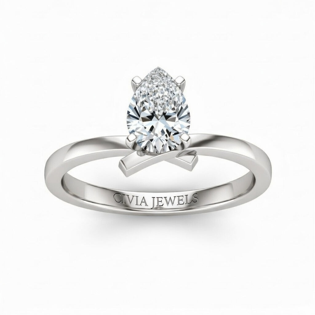 Silver Pear Diamond Solitaire Engagement Ring With Modern Twist Shank