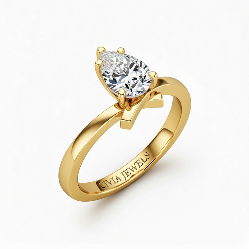 Yellow Gold Pear Diamond Solitaire Engagement Ring With Modern Twist Shank