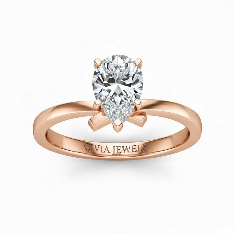 Rose Gold Pear Diamond Solitaire Engagement Ring With Modern Twist Shank