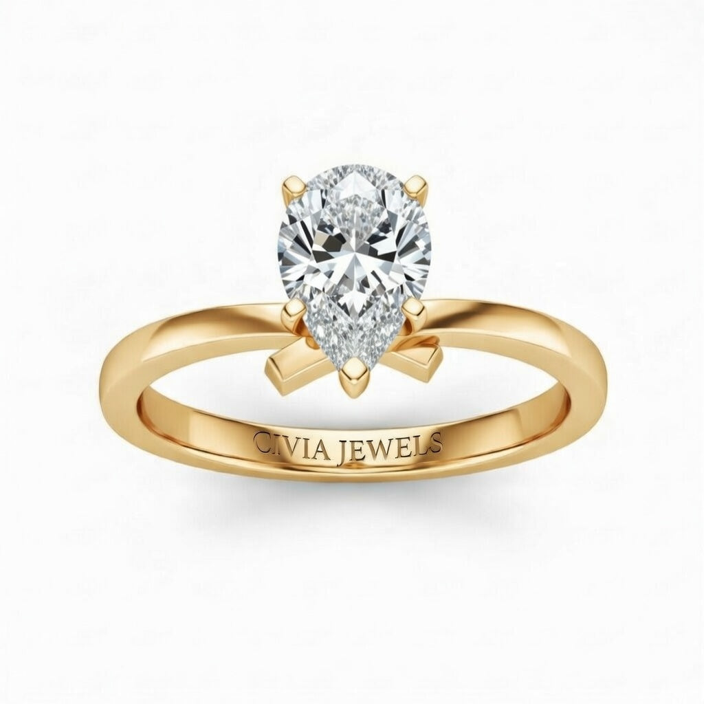 Yellow Gold Pear Diamond Solitaire Engagement Ring With Modern Twist Shank