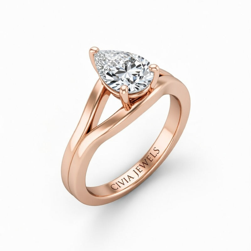 Rose Gold Pear Cut Solitaire Engagement Ring with Contemporary Bypass Shank