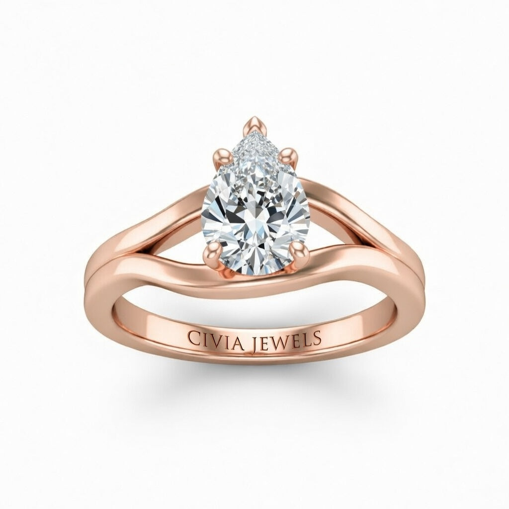 Rose Gold Pear Cut Solitaire Engagement Ring with Contemporary Bypass Shank