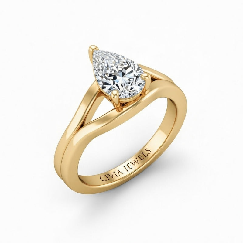 Yellow Gold Pear Cut Solitaire Engagement Ring with Contemporary Bypass Shank