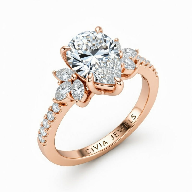 Rose Gold Pear Cut Engagement Ring With Marquise Diamond Floral Side Clusters And Pavé Band