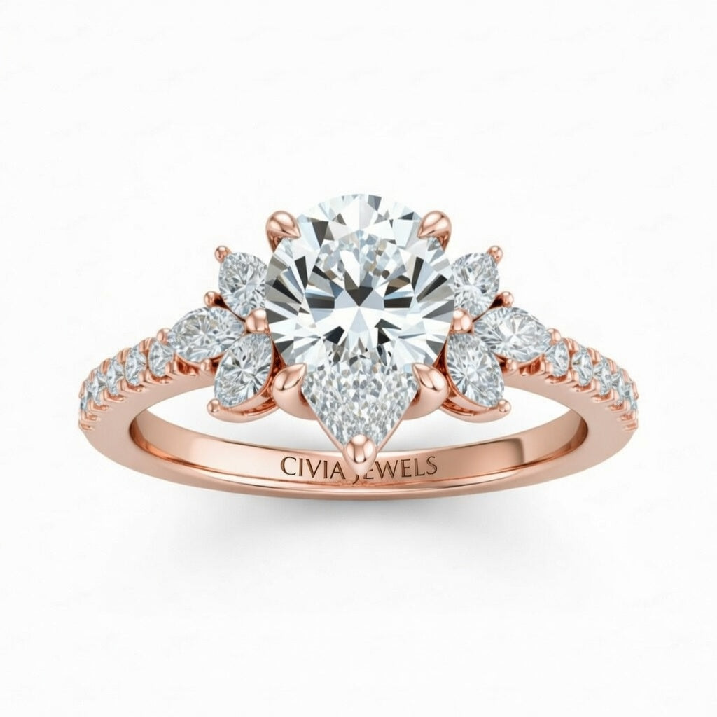 Rose Gold Pear Cut Engagement Ring With Marquise Diamond Floral Side Clusters And Pavé Band