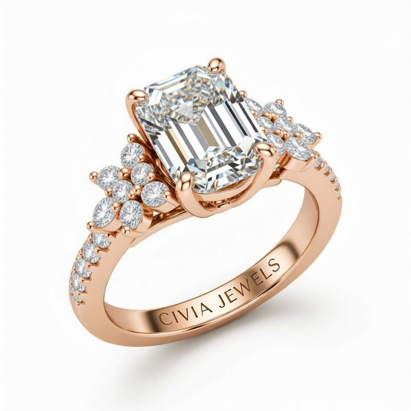 Rose Gold Emerald Cut Engagement Ring With Floral Diamond Cluster Sides And Pavé Band