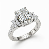 Silver Emerald Cut Engagement Ring With Floral Diamond Cluster Sides And Pavé Band