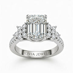 Silver Emerald Cut Engagement Ring With Floral Diamond Cluster Sides And Pavé Band