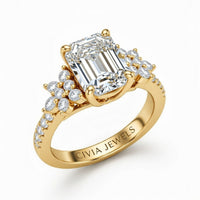 Yellow Gold Emerald Cut Engagement Ring With Floral Diamond Cluster Sides And Pavé Band