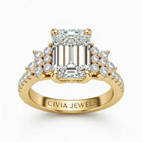 Yellow Gold Emerald Cut Engagement Ring With Floral Diamond Cluster Sides And Pavé Band