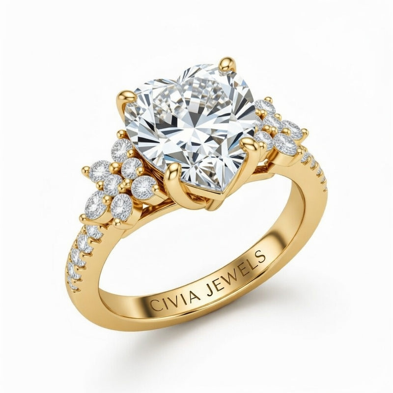 Yellow Gold Heart Cut Engagement Ring With Floral Diamond Cluster Sides And Pavé Band