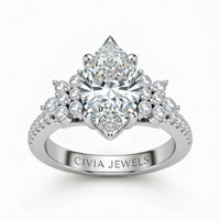 White Gold Marquise Cut Engagement Ring With Floral Diamond Cluster Sides And Pavé Band