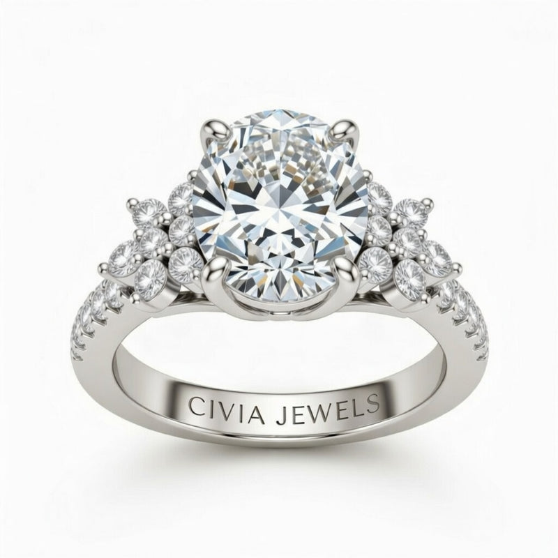 Silver Oval Cut Engagement Ring With Floral Diamond Cluster Sides And Pavé Band