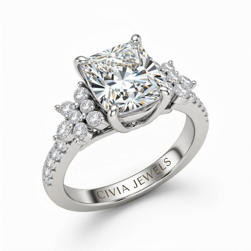 White Gold Princess Cut Engagement Ring With Floral Diamond Cluster Sides And Pavé Band