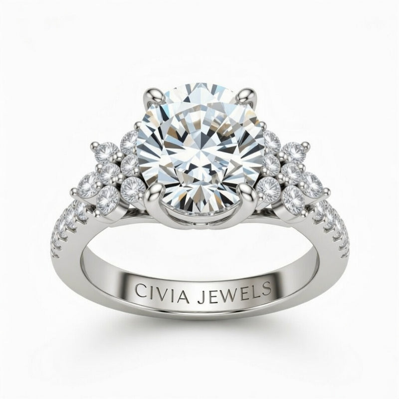 White Gold Round Cut Engagement Ring With Floral Diamond Cluster Sides And Pavé Band