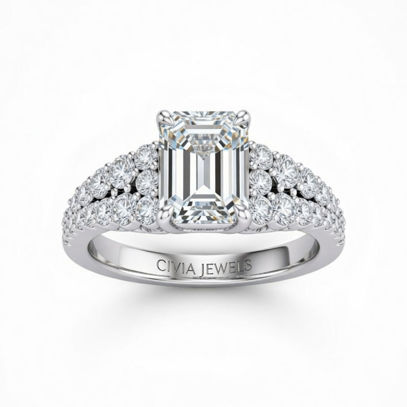 Silver Emerald Cut Solitaire Engagement Ring With Pavé Diamond Band And Classic Four-Prong Setting