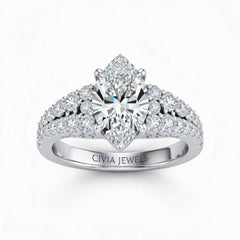White Gold Marquise Cut Solitaire Engagement Ring With Pavé Diamond Band And Classic Four-Prong Setting